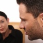 male client talking with female therapist. 