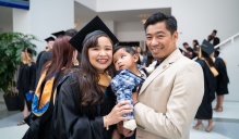 graduate with family.