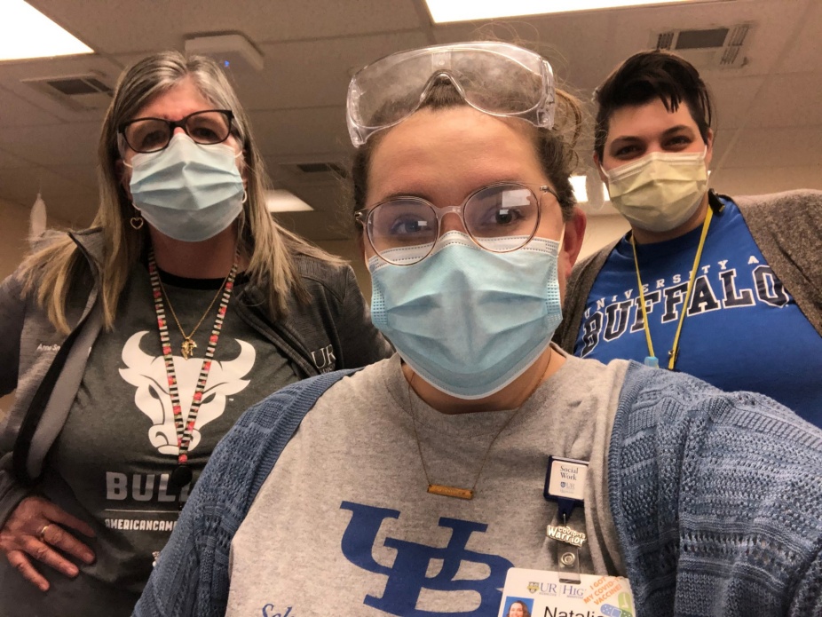 Anne Smith, MSW ’02, Natalie Geisbuesch, MSW '19, and Stephanie Seeber, MSW ’19, masked up and wearing UB t-shirts. 