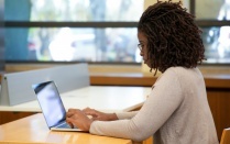 Woman taking online courses. 