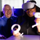 Patrick Rosenberger works with Khalidah Sabir on a virtual reality simulation. 