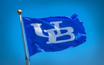 blue flag with UB logo. 