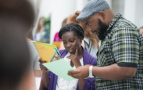 two new social work students at orientation in discussion. 
