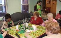Elderly people playing Bingo. 