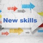 Illustrated arrows graphics that says "New skills". 