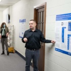 Doctora student presenting poster session. 