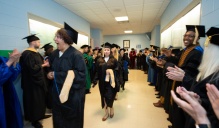 Zoom image: excited students walking to ceremony