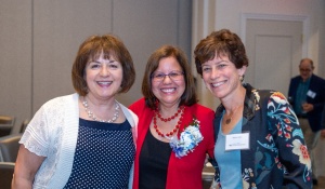 Luz M. Lopez poses with colleagues. 