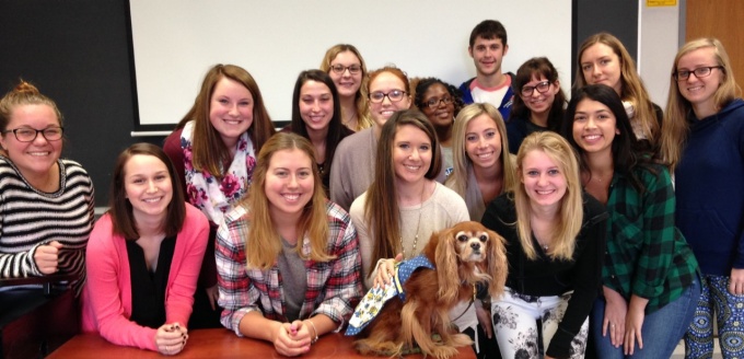Zoom image: Adjunct instructor Day Cummings' dog Isabella visits her MSW students at UB, and she says, &quot;I find it very beneficial for her to come to class, especially when discussing trauma. Bringing her relaxes the students and offers them an outlet at times when it is needed the most.&quot; 
