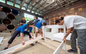 Zoom image: Social Impact Fellows participated in a day of building beds for the Beds for Buffalo program with site agency and 2nd place pitch winner, The Service Collaborative of WNY. 