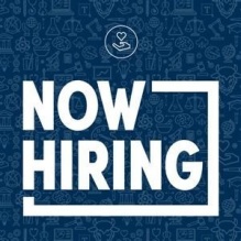 Noelle St. Vil standing in front of a grey staircase.