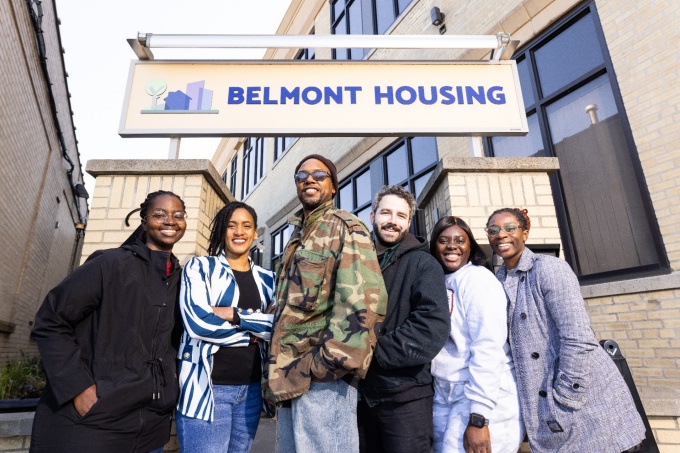 Claudine Karambizi, Noelle M. St. Vil, Christopher St. Vil, Adam Selon, Joyce Adeola Jekayinoluwa, Vanity Jones outside Belmont Housing. 