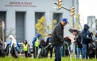 Zoom image: For Dean Keith A. Alford (center), celebrating the school’s 90th anniversary through service was a perfect fit with the values of the school and profession. 