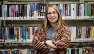 Leah Topek-Walker in a library. 