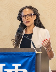 Melissa Harris-Perry speaking at 90th anniversary celebration. 