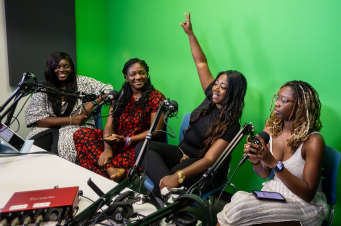 BBRIDGE recording a podcast. 