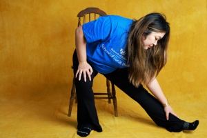 Tiffany Nhan in extended leg side stretch pose.