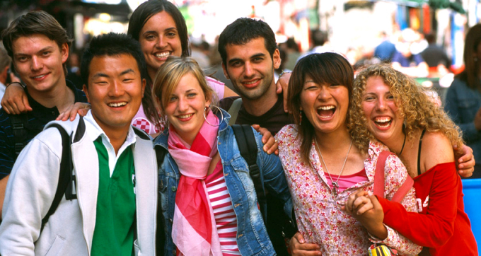 group of diverse students smiling. 