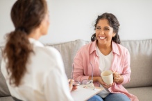 A woman counselor with a woman client. 