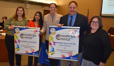 Megan Koury (left) receives the Champions of Change Award from New York State, highlighting the work done with the Student Championship Team in Niagara Falls City School District. 