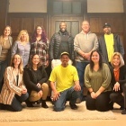 Project Manager Megan Koury (second in from the bottom right) and Consultant Ann Adams (Bottom right) join the Niagara Falls Staff and Community Partners of Housing Visions for an intimate training session on trauma-informed practices. 